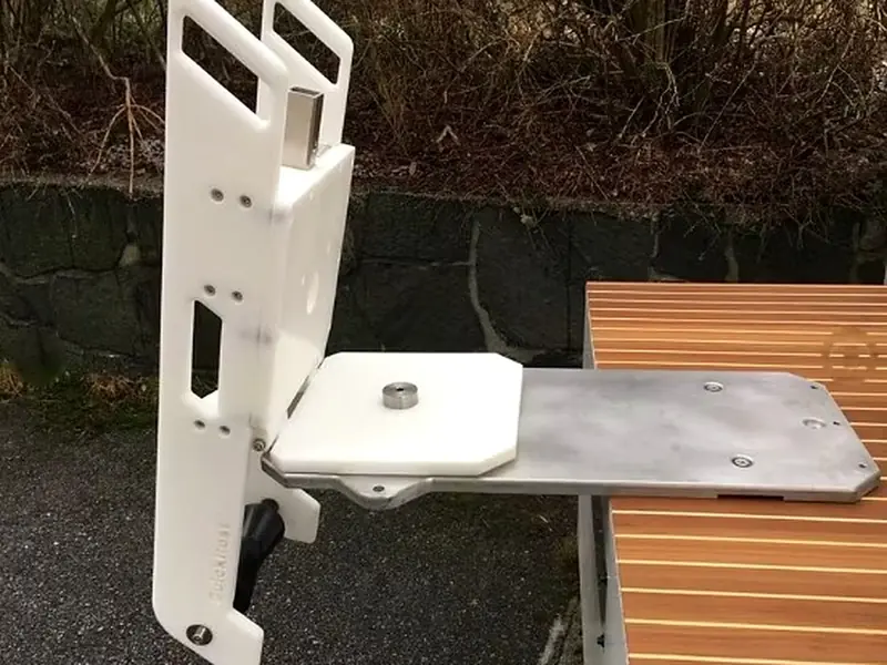 The marine-grade aluminium special plate under a QR 250 cradle that is folded up
